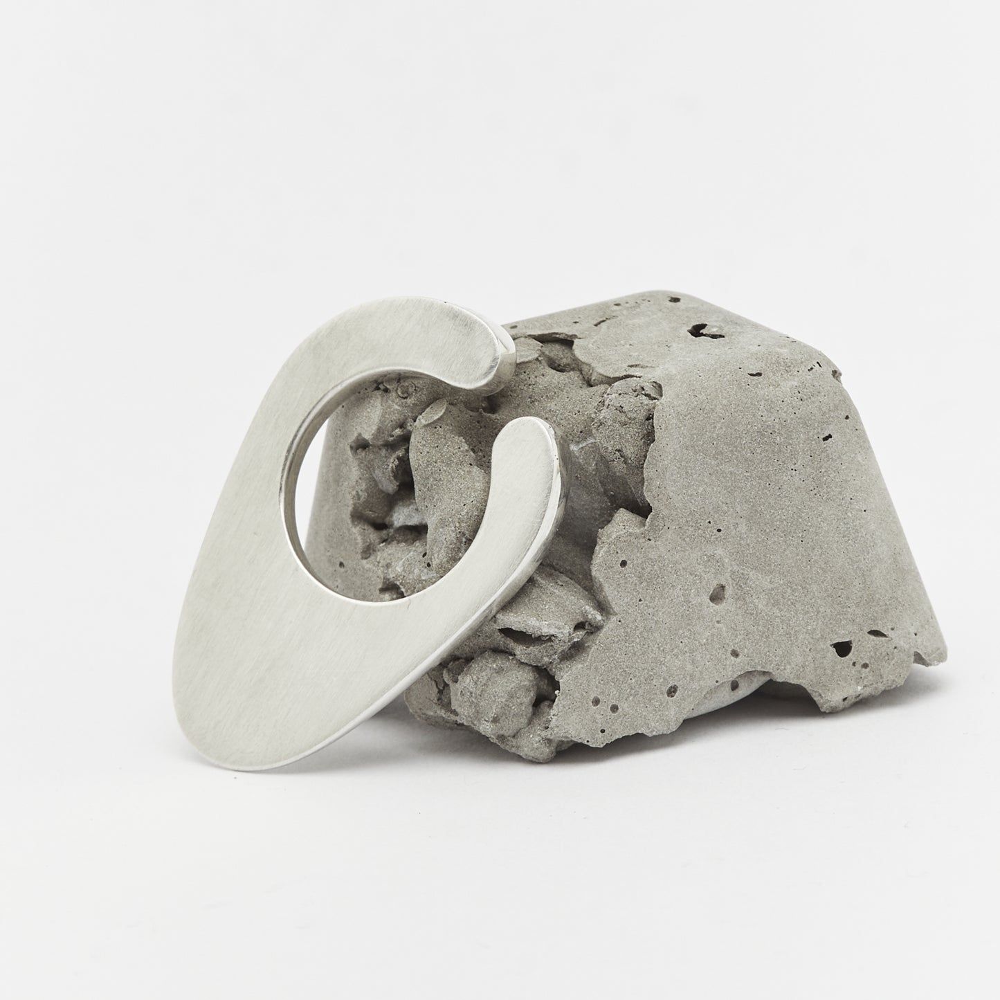 Contemporary silver ear cuff minimalist negative space rock design jewellery by AROE - Unique handcrafted silver ear cuff – statement jewellery by AROE.