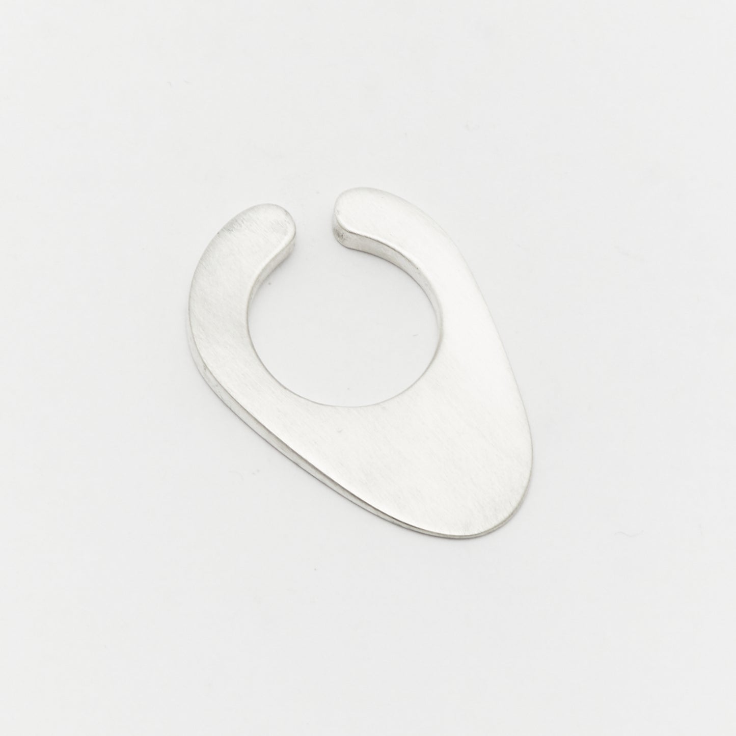 Contemporary silver ear cuff minimalist negative space rock design jewellery by AROE - Unique handcrafted silver ear cuff – statement jewellery by AROE.