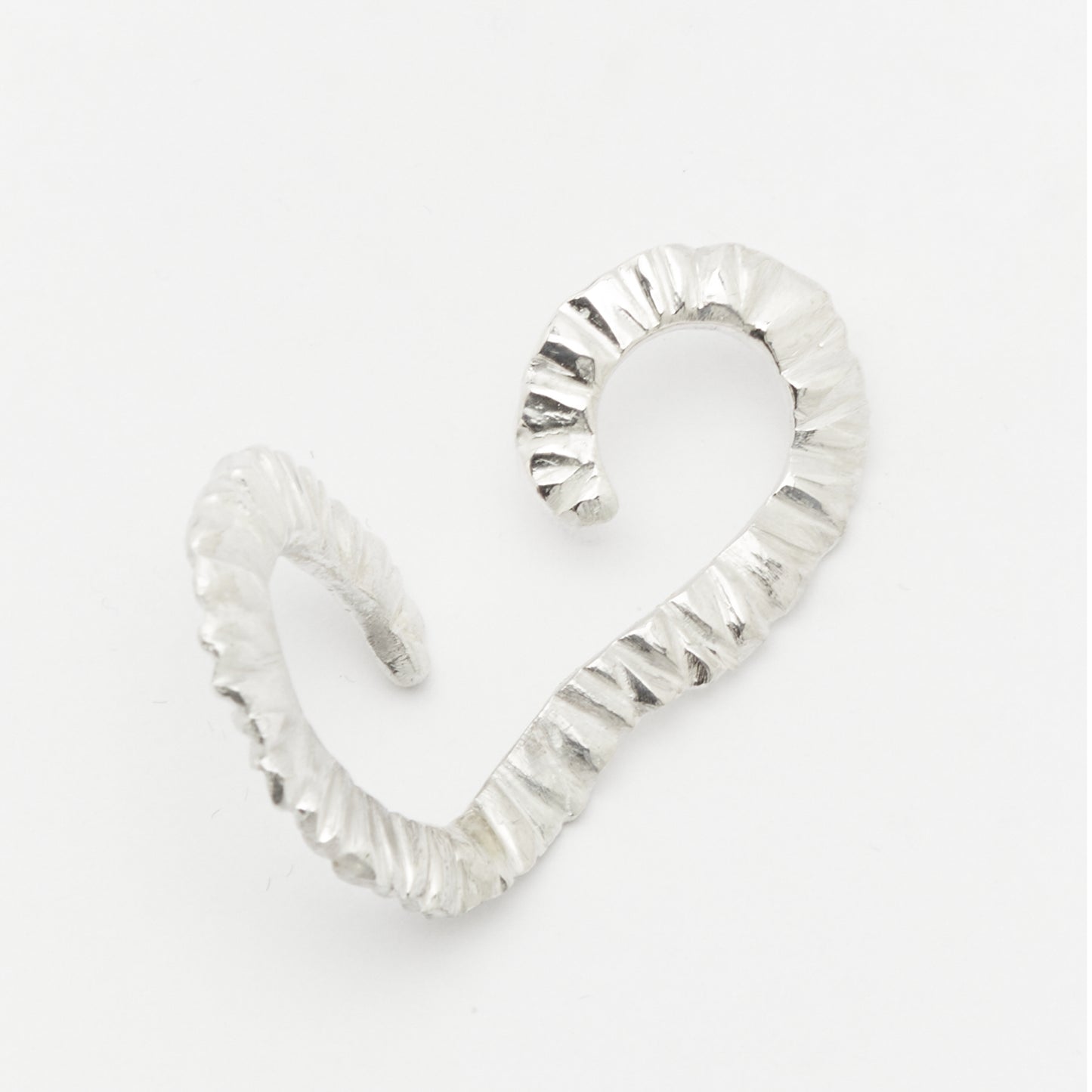 Minimalist textured sculptural silver ear cuff – AROE jewelry piece - Unique handcrafted silver ear cuff – statement jewellery by AROE.


