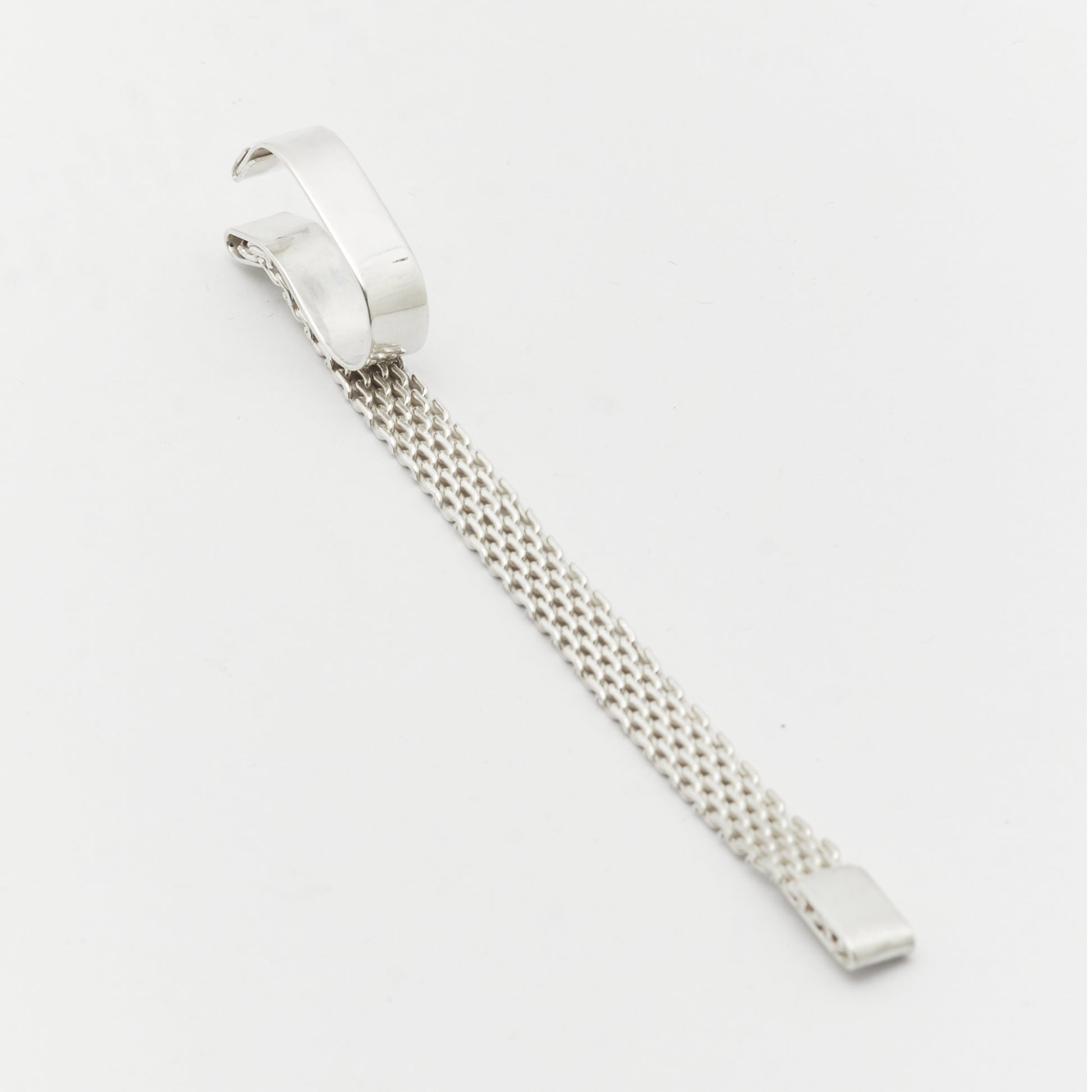 Woven and polished sterling silver ear cuff – No Justification statement jewellery by AROE