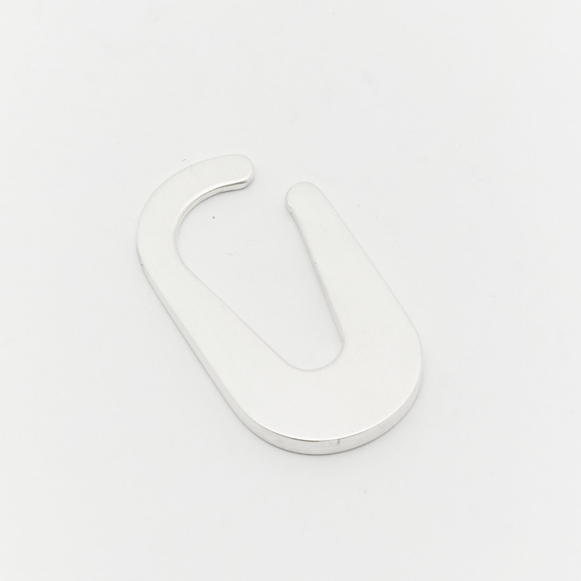 Minimalist sculptural earcuff quiet design silver rock jewelry - Unique handcrafted silver ear cuff – statement jewellery by AROE.

