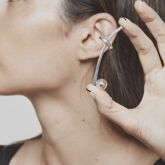 stop motion showing how to put on and take off the sense it silver earcuff, jewellery by AROE